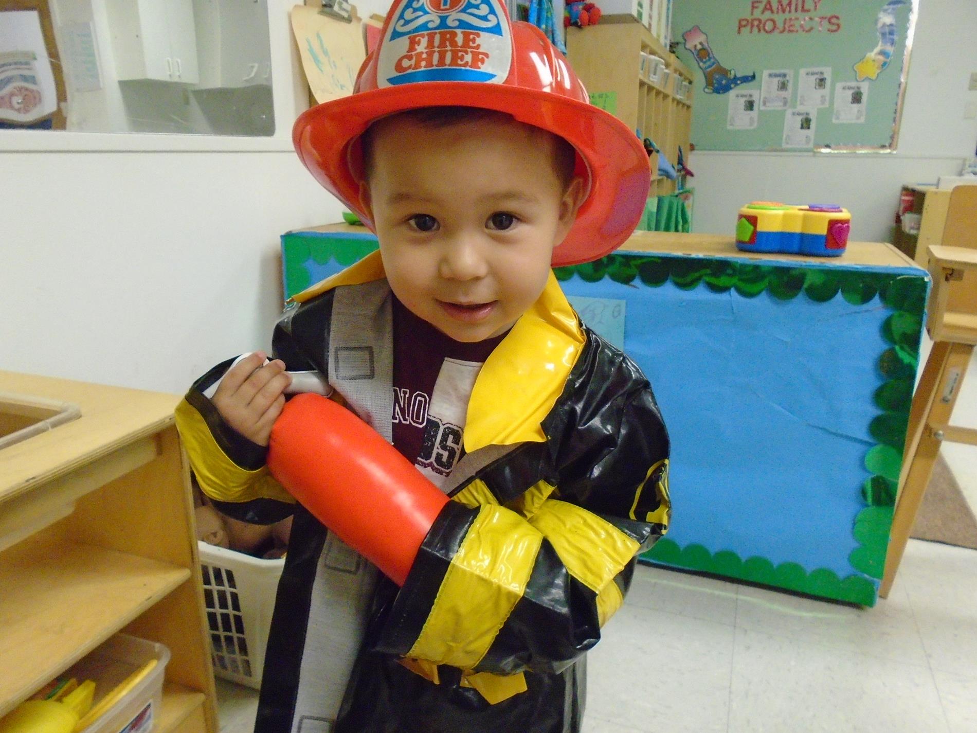 Child enjoying imaginative play in a classroom